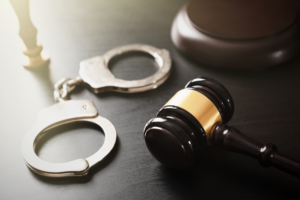 chicago dui defense chicago dui defense - handcuffs on a table as a reference | The Law Office of Purav Bhatt